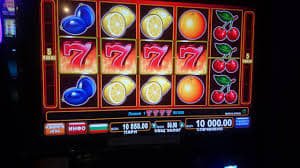 benzjl online slot game interface with multiple game categories displayed